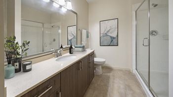 The Hendrix Apartments a bathroom with a sink and a shower and a toilet at The Hendrix, Atlanta, GA, 30329